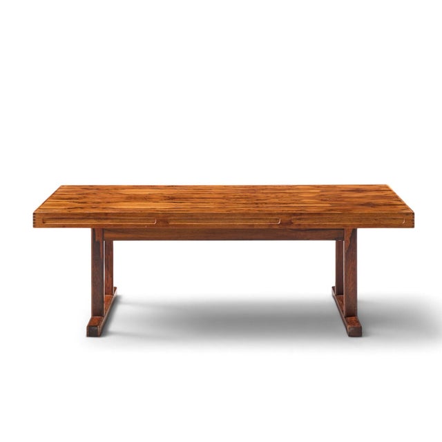 Torbjørn Afdal for Bruksbo Mid Century Danish Rosewood Coffee Table This coffee table measures: 59 wide x 31.5 deep x...