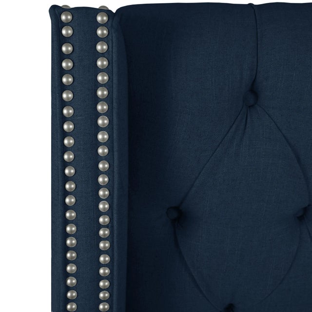 This Upholstered Bed brings hotel luxury to your bedroom. Crafted by hand, the headboard is designed with deep button-...