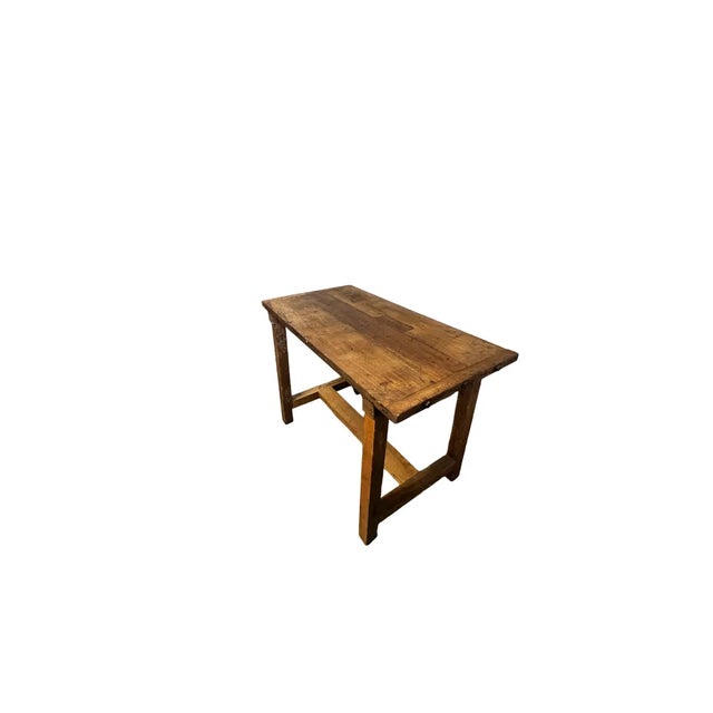 Vintage work table dating back to the early 1900s, crafted from hornbeam wood, known for its hardness and durability. This...