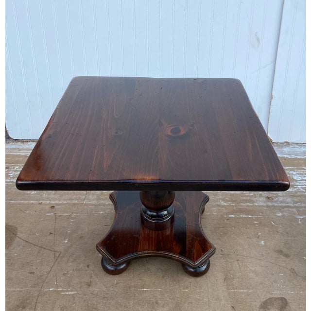 This is a beautiful vintage Ethan Allen Antiqued Pine Square Pedestal Cocktail Table #12-8054. Solid and sturdy with minor...