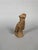 Bankoni statuette, Mali, 13th-15th century, red ochre terracotta. The statuette represents a seated female figure, her...