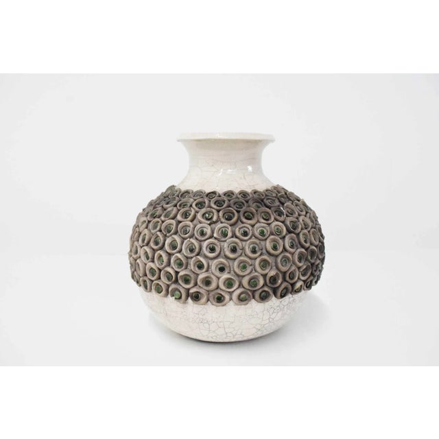 This exquisite Mid Century Modern Studio Ceramic Vase, available at circa20c, is a stunning addition to any home. Lots of...