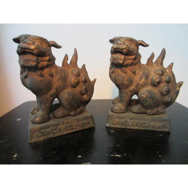 Chinese gilt bronze, cast bronze antique, foo dogs. Protective lions in pair with Charming, impressive workmanship...