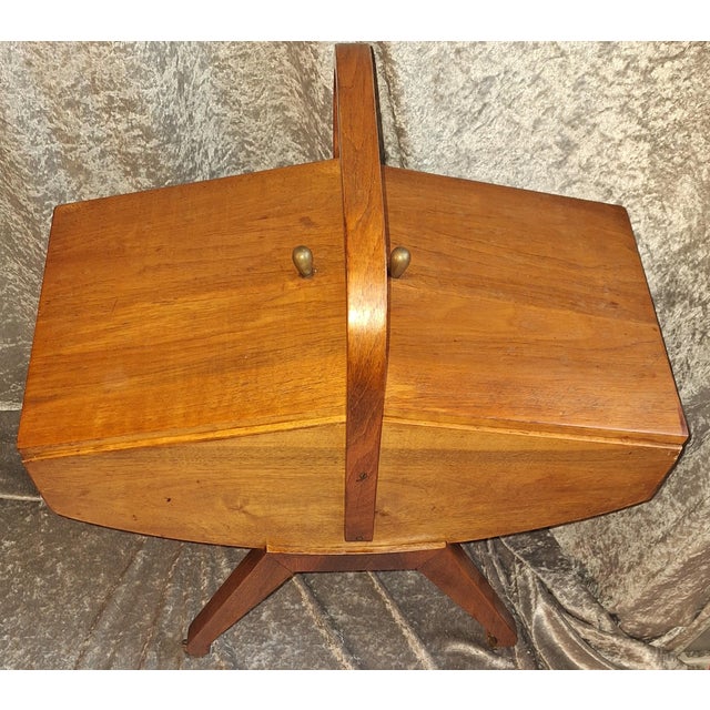 Mid-Century German Sewing Table on Casters in Walnut with Removable Oak Inserts, 1960s, in Very Good conditions. Designed...