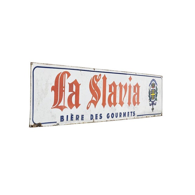 Slavia enameled advertising plaque. This piece is designed in the style of the selected designer and/or manufacturer
