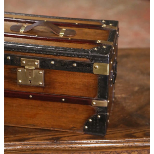 Full of character and old-world charm, this antique miniature travel trunk combines the craftsmanship of traditional...