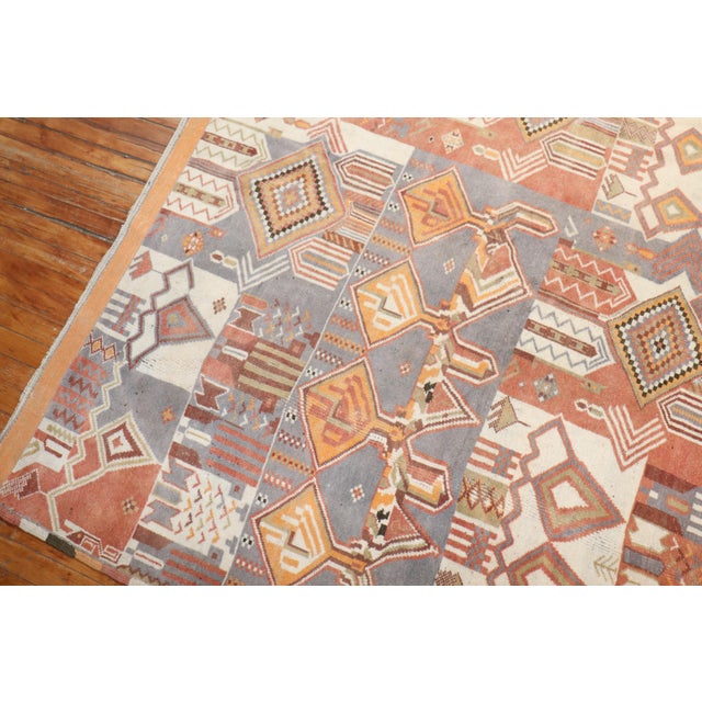 A whimsical oversize Moroccan Rug from the 3rd quarter of the 20th century. Measures: 9'9'' x 16'.