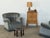 Pair of Danish lounge chairs in grey-blue velvet, in the manner of Fritz Hansen, circa 1940. Designer and maker are...
