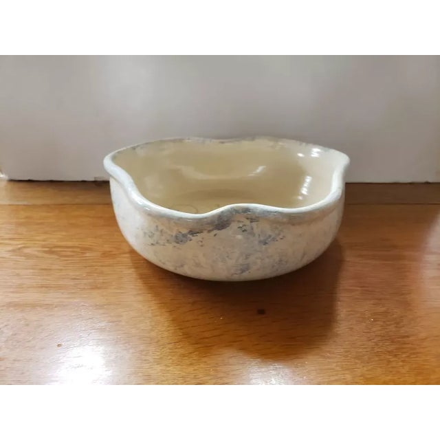 This is a Vintage E.P. Pottery Marshall, Texas Spongeware Apple Shaped Bowl. It measures 3 1/2" high and 10 3/4" x 10"....