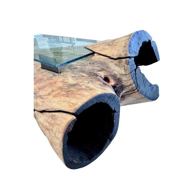 This Impressive rustic table is created from a reclaimed 250 year old Silver Maple trunk and it must be seen to fully...