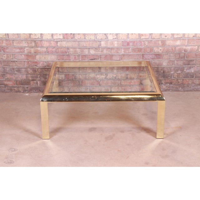 A gorgeous Milo Baughman style modern Hollywood Regency coffee or cocktail table By the Design Institute of America USA,...