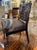 The antique Century English Chinoiserie Vanity Chair is a luxurious and ornate piece of furniture. This chair, featuring...