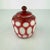 A beautifully crafted vintage Peking glass lidded jar featuring a white glass base overlaid with a rich ruby red layer,...
