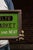 Early 20th Century Reverse-Painted Brooklyn Meat-Market Scalloped Glass Sign For Sale In Chicago - Image 6 of 7