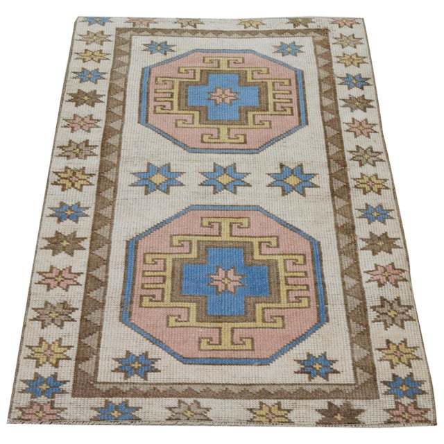 Hand-knotted with care using traditional rug-making techniques, this wool rug blends timeless craftsmanship with a modern...