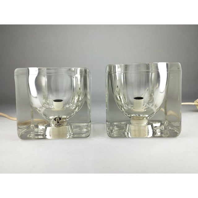 This beautiful pair of table lamps, model TA 14, dates from the 1970s and was manufactured by Peill & Putzler. The...