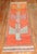 Runner size mid 20th-century Turkish Anatolian rug with a pigeon pattern on an orange field