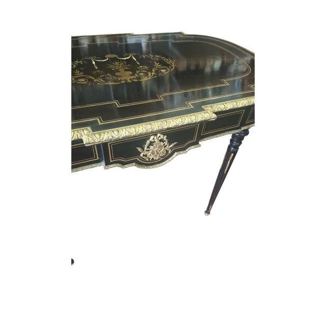 A very beautiful Boulle center table from the Napoleon III period, in very good condition. This table has a drawer. The...