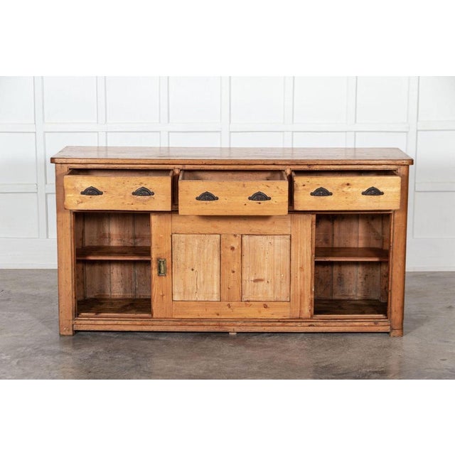 Circa 1880 Large 19th century English pine dresser base. Measures: W185 x D54 x H94 cm.