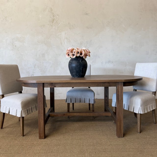 Introducing our exquisite Amber oval dining table, crafted from beautiful white oak for a touch of elegance. Its solid...