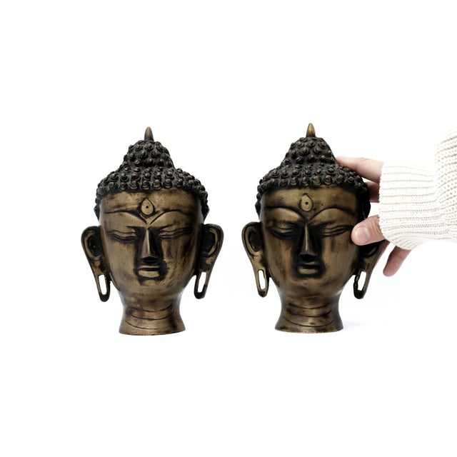 Vintage Buddha Bust; set of 2. This listing is for 2 vintage brass Buddha bust figurines. Place them in any room for added...