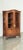 Louis XV Style Carved Walnut Stained Vitrine Armoire This vitrine is a lovely example of the Louis XV style, with a bonnet...