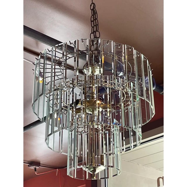 A shimmering three tiered glass chandelier from the 1960s is on offer here. This has such a light presence and would look...