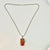 A lovely Italian Art Nouveau Sterling and Amber Pendant Necklace from the 1970s. The pendant features a large piece of...