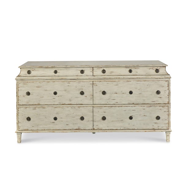 The Swedish 6-drawer double dresser, known for its clean lines and practical design, reflects the influence of Gustavian...