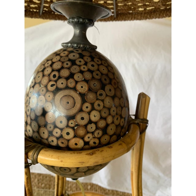 This is a beautiful and unique lamps. The base of the lamp is bamboo and Bali wood. See enlarged photo to see the beauty...