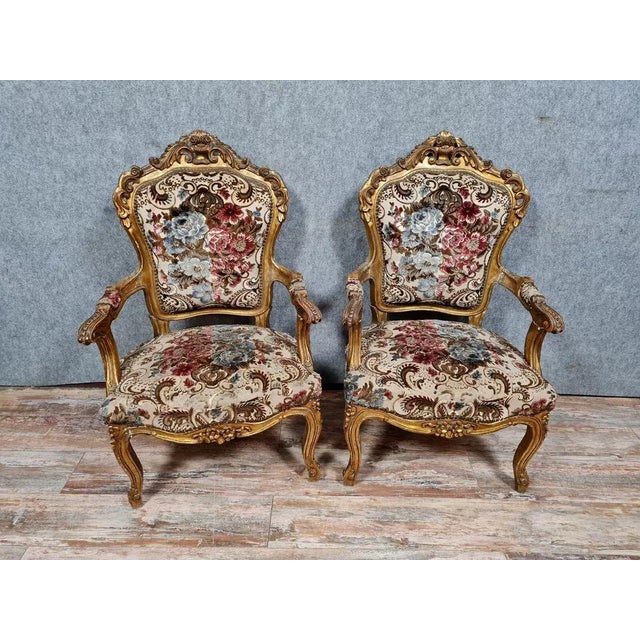 Attractive pair of Louis XV-style Baroque armchairs in gilded and carved wood, circa 1900. Generously proportioned frame...