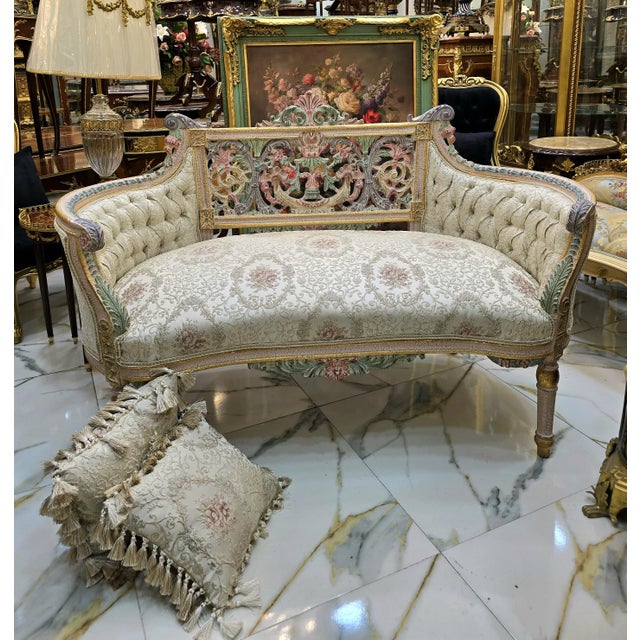 This exquisite French Rococo-style sofa brings a romantic and luxurious presence to any interior. The beautifully carved...
