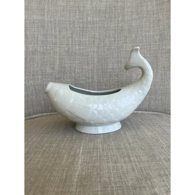 A whimsical and functional piece from Dansk International, this koi fish–shaped gravy boat is both a serving essential and...
