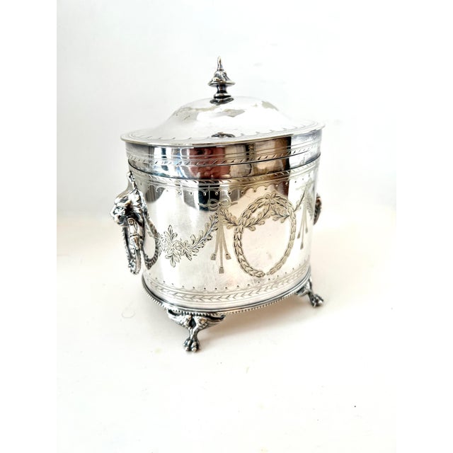 A beautifully designed Silver Plate Tea Caddy with Hinged Lid. The piece is a compliment to any Tea station, counter, or...