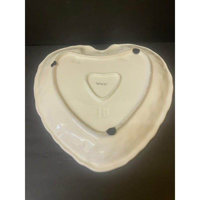An extraordinary and exceptionally rare vintage ceramic heart-shaped serving platter in the iconic 1989/1990 pink-and-...