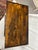 A diminutive English Regency highly-figured solid rosewood three-tiered etagere with barley twist or corkscrew supports...