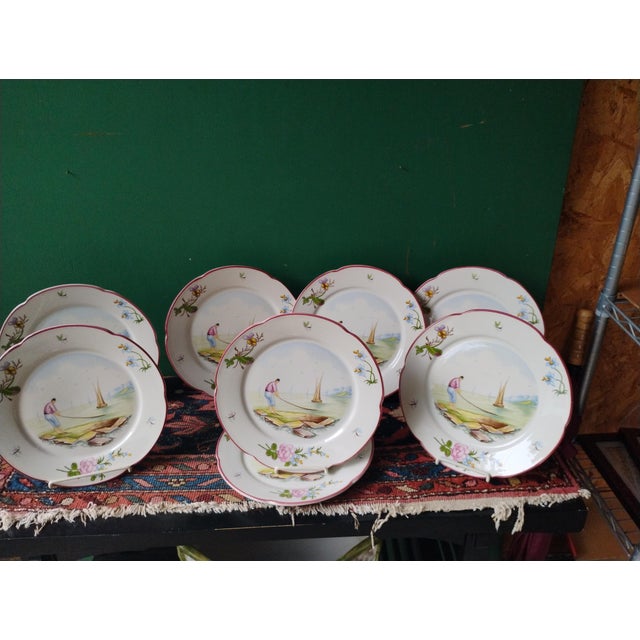A Vintage set of rare to find fishing dinner plates by C.E.Corey designs. Excellent condition with some crazing on plates....