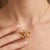 The wings are artfully adorned with four vibrant, marquise and pear-cut natural citrine gemstones. The honeyed, golden-...