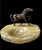 Bronze/metal horse standing on a beautiful green onyx slab. Could be used as ashtray or a unique catch all dish.