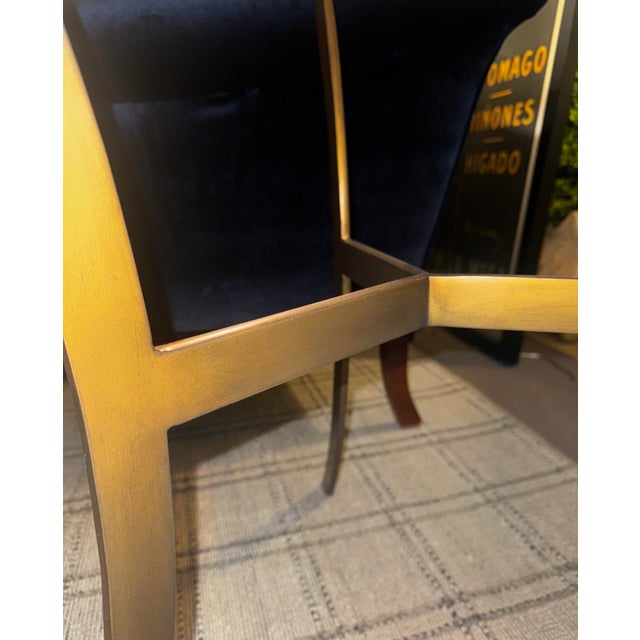 Hickory Chair side table with six sided softly veined marble top with brushed brass tri shaped base. This table is a...