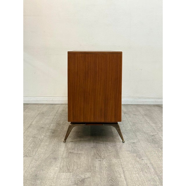 Beautiful mid century modern walnut dresser with brass hardware manufactured by R Way, professionally restored.
