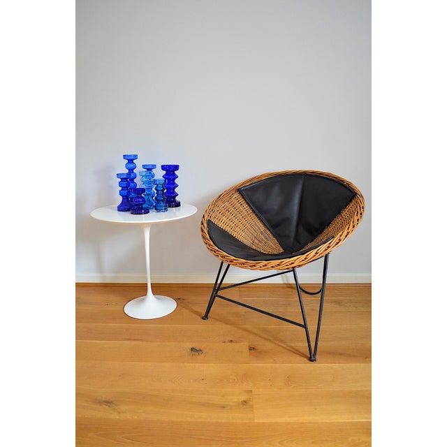 Mid-Century Wicker Chair from the 1950s-1960s - This wicker chair, with its hemispherical seat shell, is typical of the...