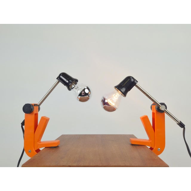 Type 2323 Revue Clamp Lamps Orange Clip Lamp, 1970, Set of 2, in Flawless conditions. Designed 1970 to 1979 This piece has...