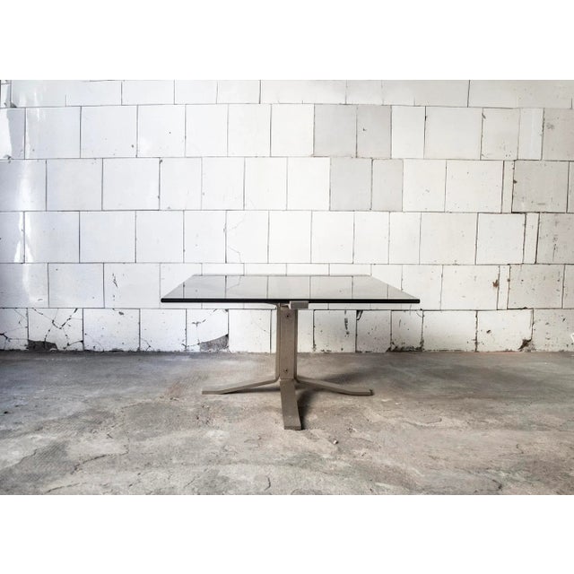 Table with steel base and glass top. Designer Gianni Moscatelli Formanova manufacturer 60's. I have official proof of...