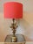 Midcentury Italian gilt flower table lamp, circa 1950s. Full metal toleware table lamp depicting a beautiful bunch of...