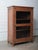 This vintage Indian display cabinet is crafted from solid teak and features a beautifully weathered surface that...