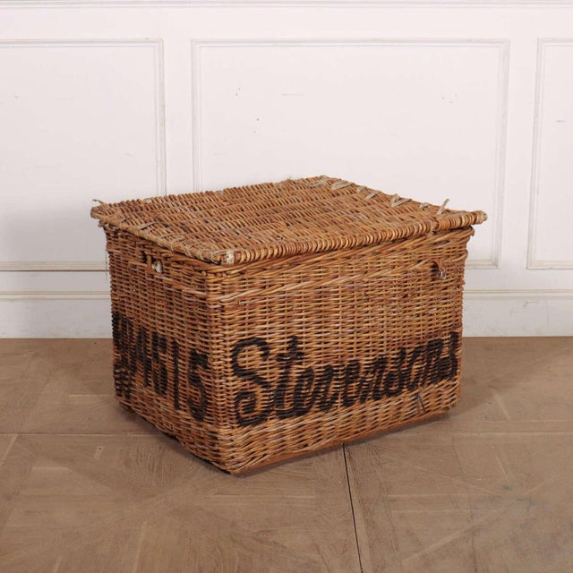 English wicker basket from a fabric mill. Would make a wonderful log basket. 1900. This piece is designed in the style of...