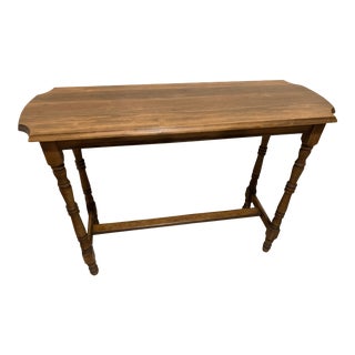 Vintage Carved Wood Console Table Featuring Plank Top With Shaped Ends, Turned Legs and H Stretcher For Sale