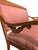 An elegant late 19th-century American/Continental Neoclassical settee defined by a rolled crest rail, pierced acanthus arm...