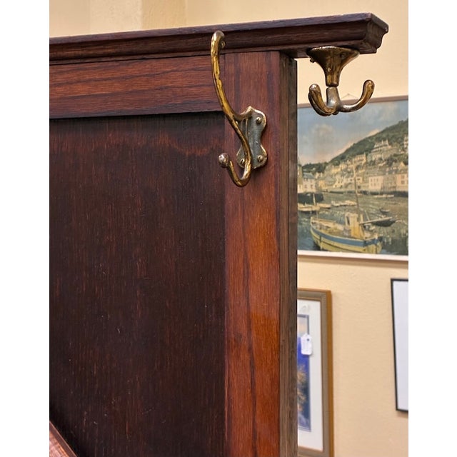 Brown Antique English Oak Hall Tree With Lift Top Seat, Umbrella Drip Trays, Mirror & Coat Hooks c.1920 For Sale - Image 8 of 8